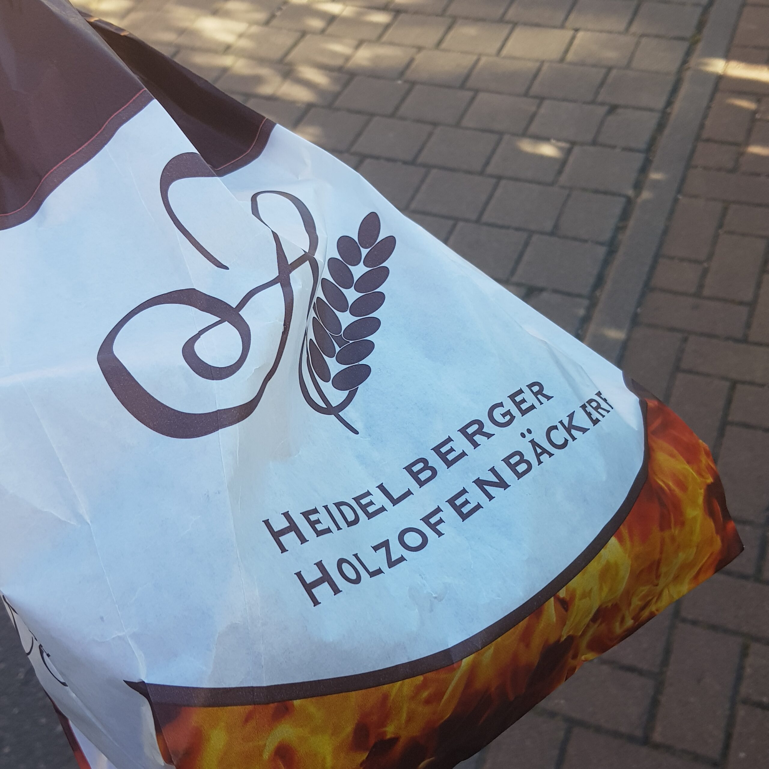Heidelberger Holzofenbäckerei Papiertüte Logo